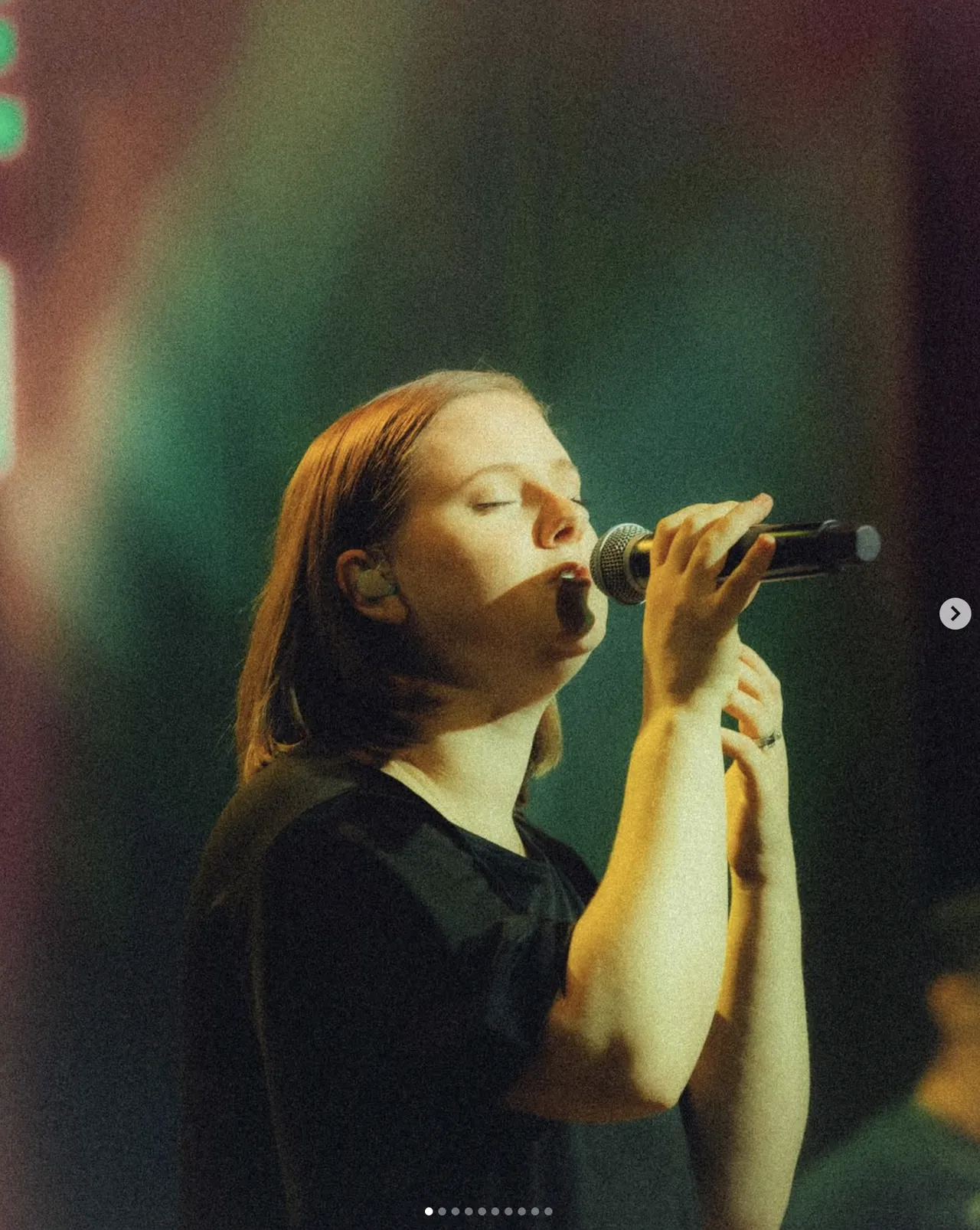 Singer practicing vocals in a studio